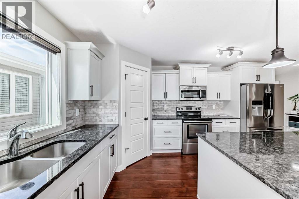 Photo 9 of 636 Aquitania Boulevard W, Lethbridge AB