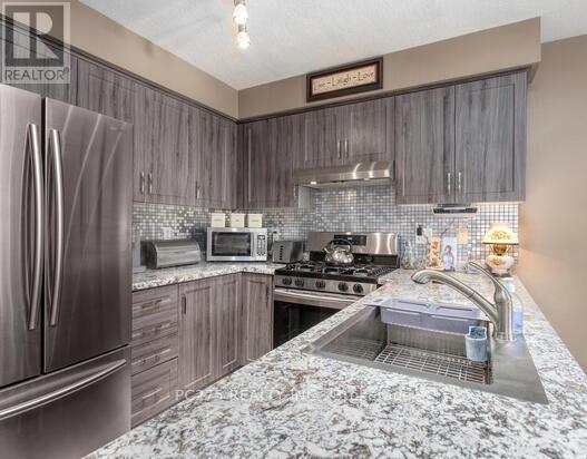 Photo 23 of 296 Millburn Boulevard, Centre Wellington ON