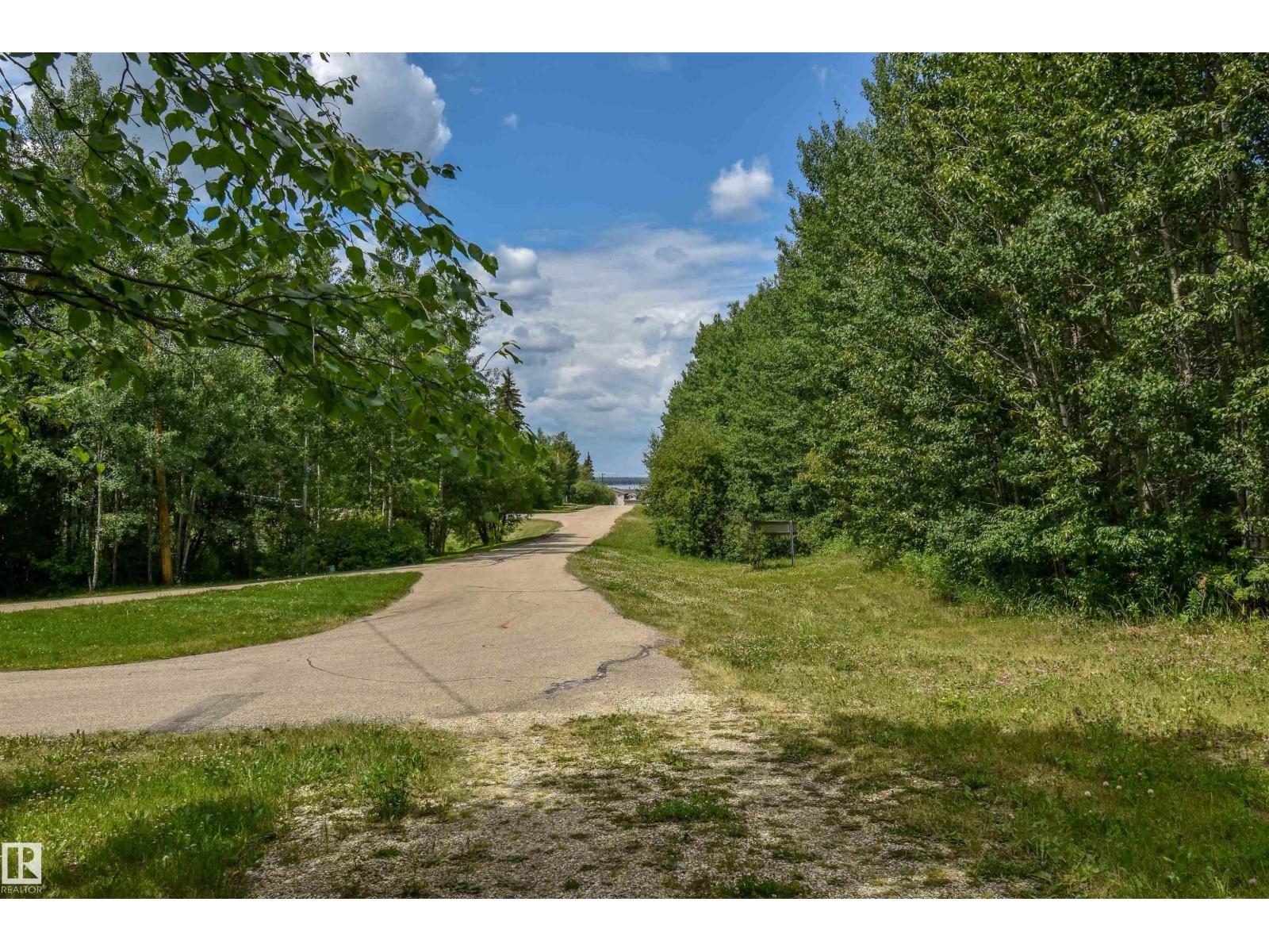 Photo 1 of 1 54429 Ste Anne Trail, Rural Lac Ste Anne County AB