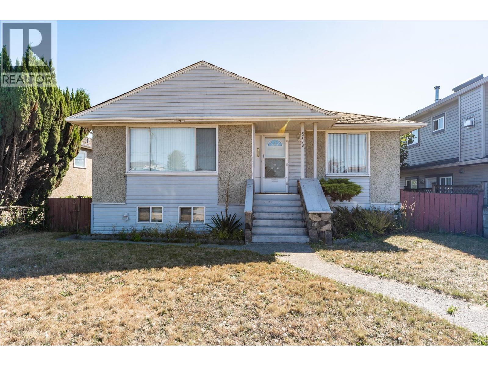 Photo 5 of 6758 Victoria Drive, Vancouver BC