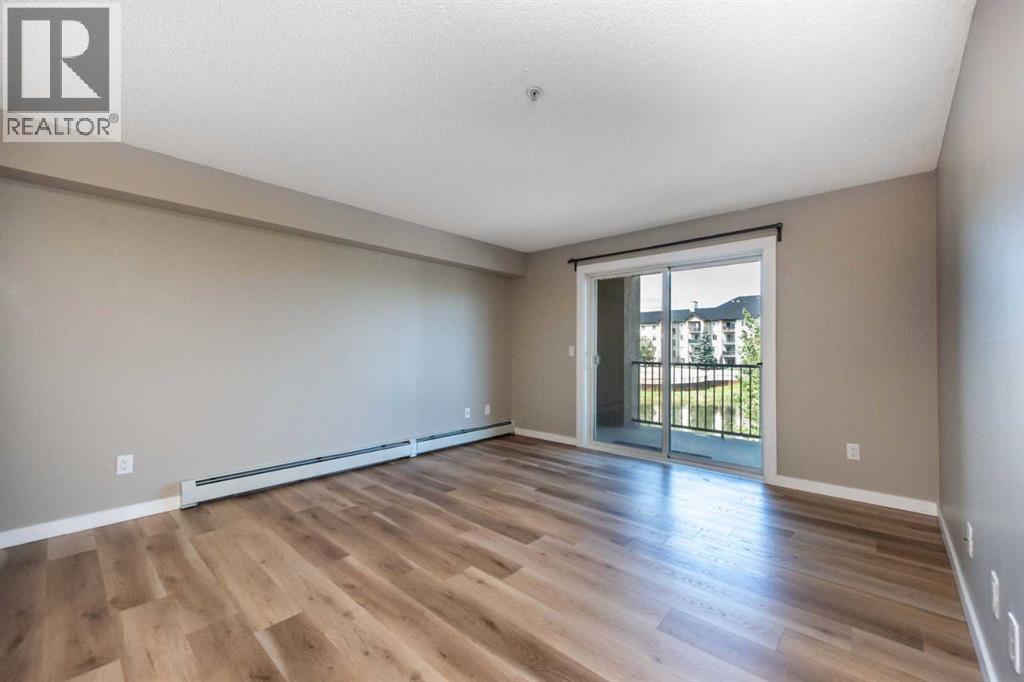 Photo 12 of 6204 304 Mackenzie Way Sw, Airdrie AB