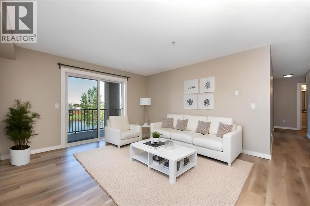 Photo 1 of 6204 304 Mackenzie Way Sw, Airdrie AB