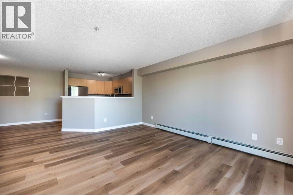 Photo 26 of 6204 304 Mackenzie Way Sw, Airdrie AB
