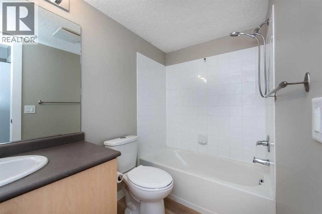 Photo 6 of 6204 304 Mackenzie Way Sw, Airdrie AB