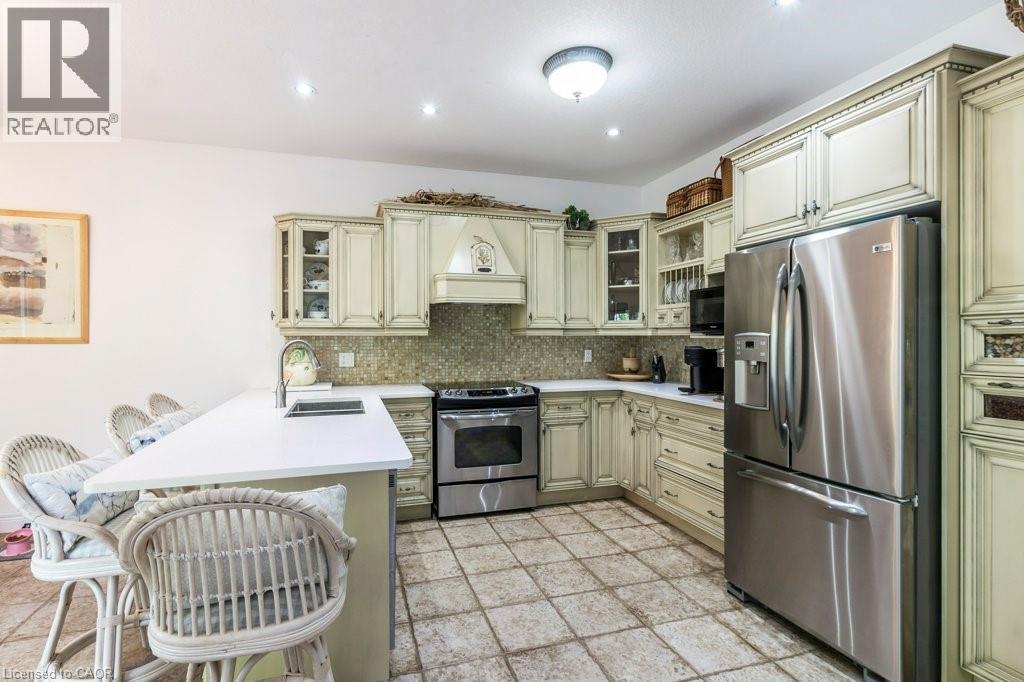 Photo 2 of 747 Garden Court Crescent, Woodstock ON