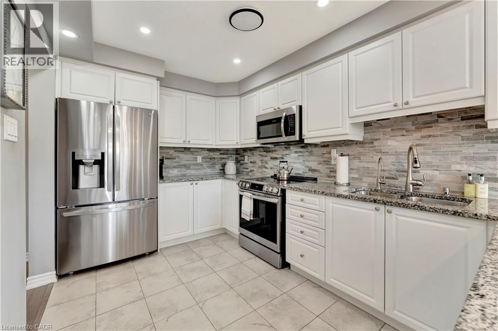 Photo 17 of 212 Waterbrook Lane, Kitchener ON