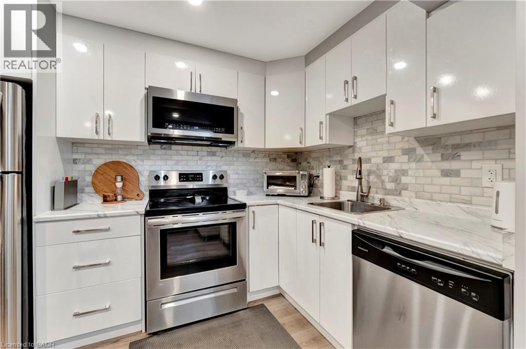 Photo 15 of 212 Waterbrook Lane, Kitchener ON