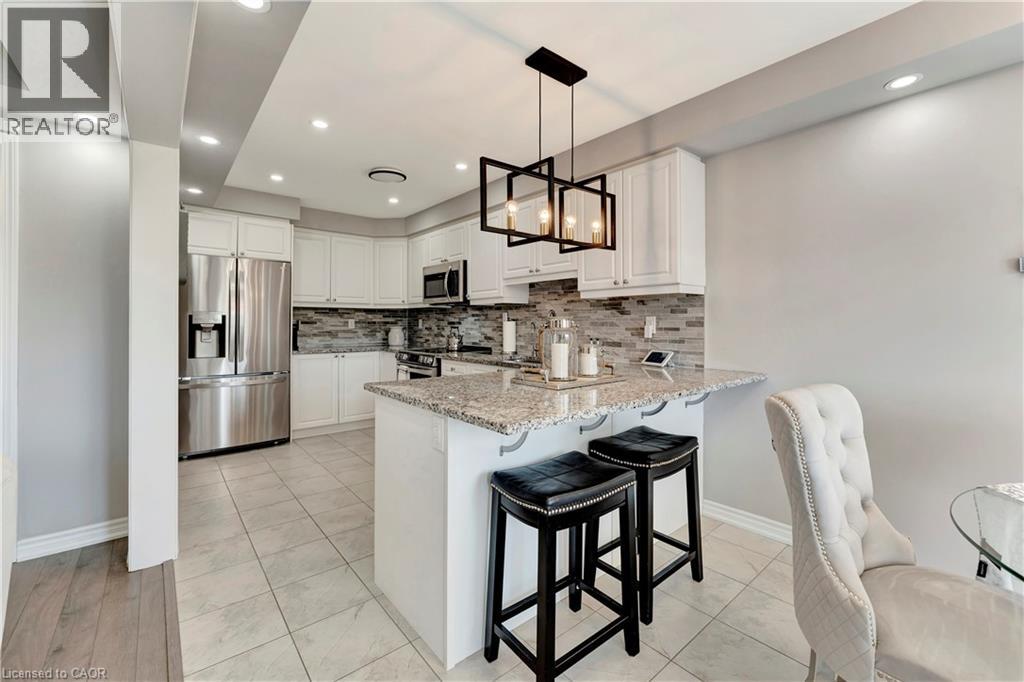 Photo 11 of 212 Waterbrook Lane, Kitchener ON