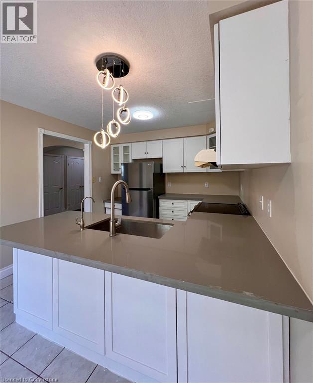 Photo 5 of 604 Columbia Forest Boulevard, Waterloo ON
