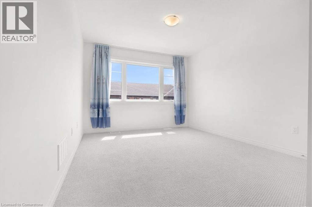 Photo 11 of 448 Blackburn Drive Unit 13, Brantford ON