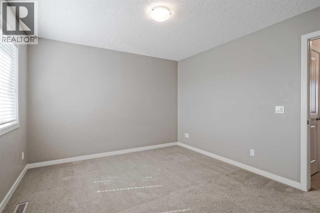 Photo 23 of 42 Willow Drive, Cochrane AB