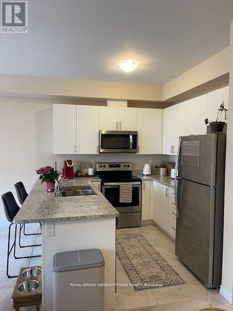 Photo 16 of 28 88 Decorso Drive, Guelph ON