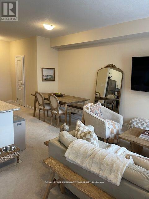Photo 3 of 28 88 Decorso Drive, Guelph ON