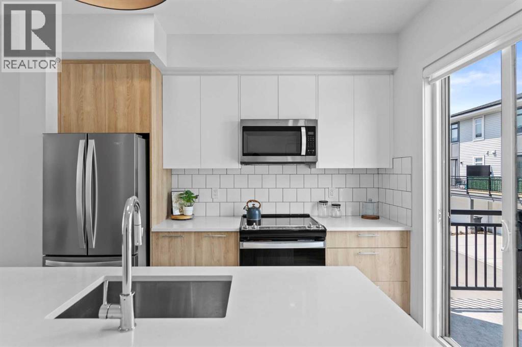Single Family House for Sale in   Belmont Drive SW Belmont Calgary 