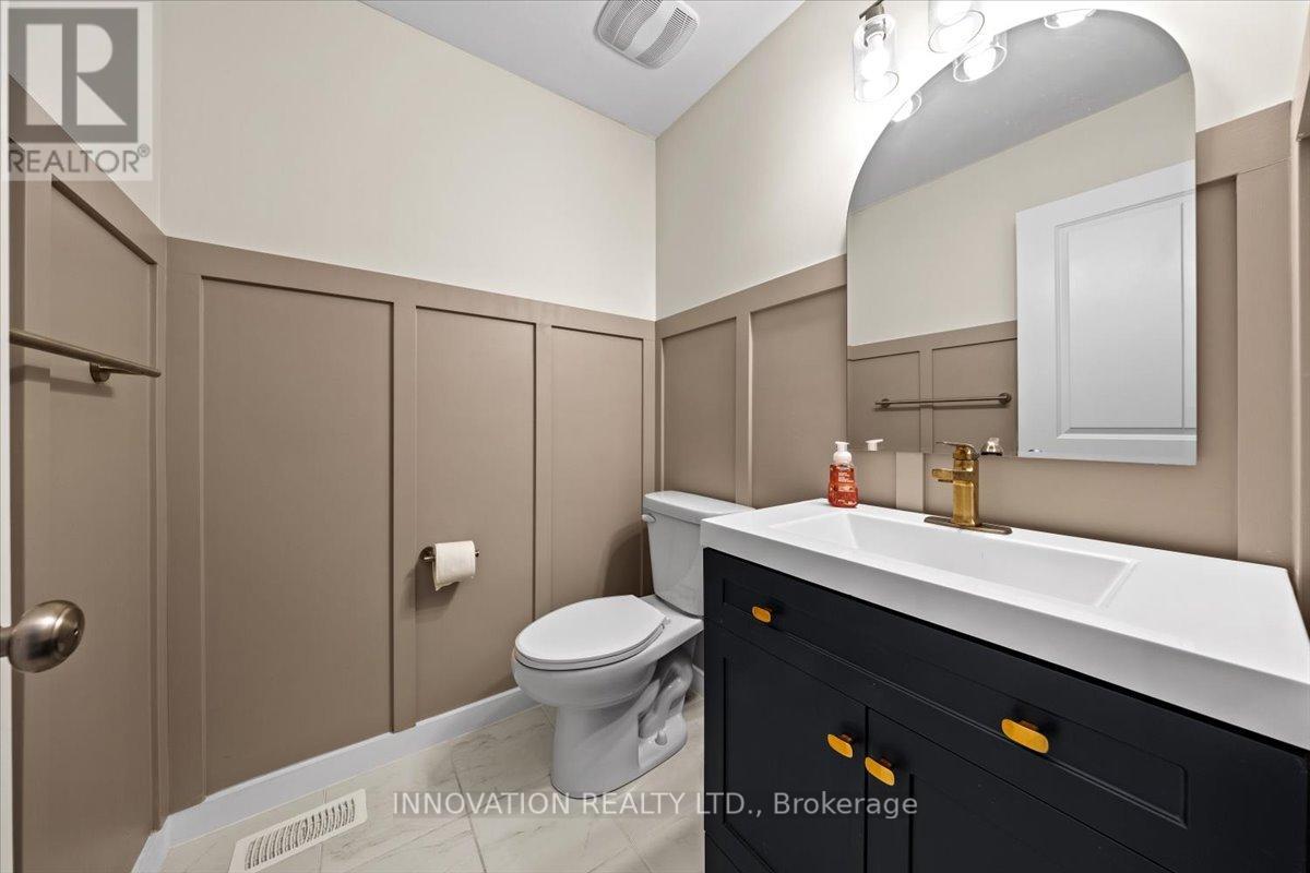 Designer inspired main floor powder room