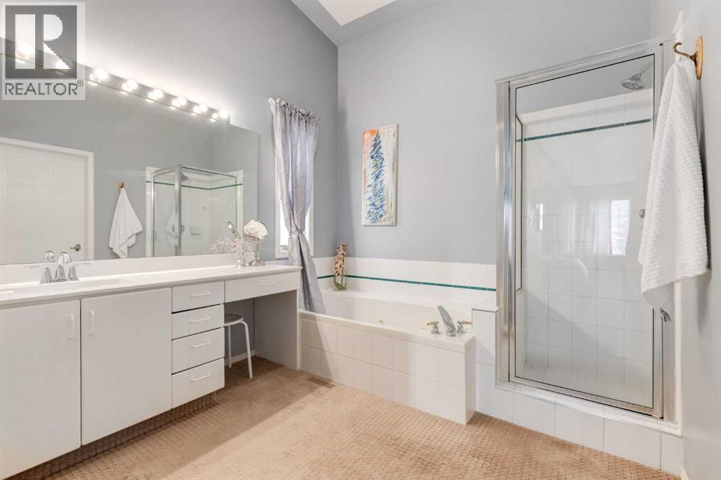 Single Family House Bungalow for Sale in  Hawkdale Circle NW Hawkwood Calgary 