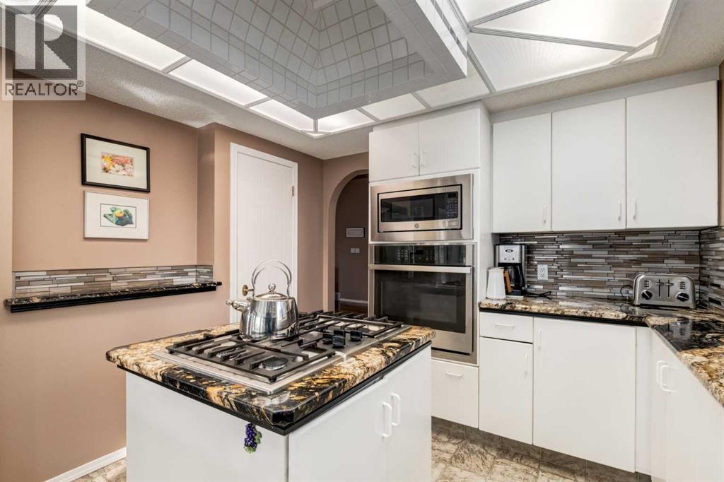 Single Family House Bungalow for Sale in  Hawkdale Circle NW Hawkwood Calgary 