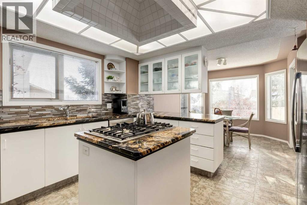 Single Family House Bungalow for Sale in  Hawkdale Circle NW Hawkwood Calgary 