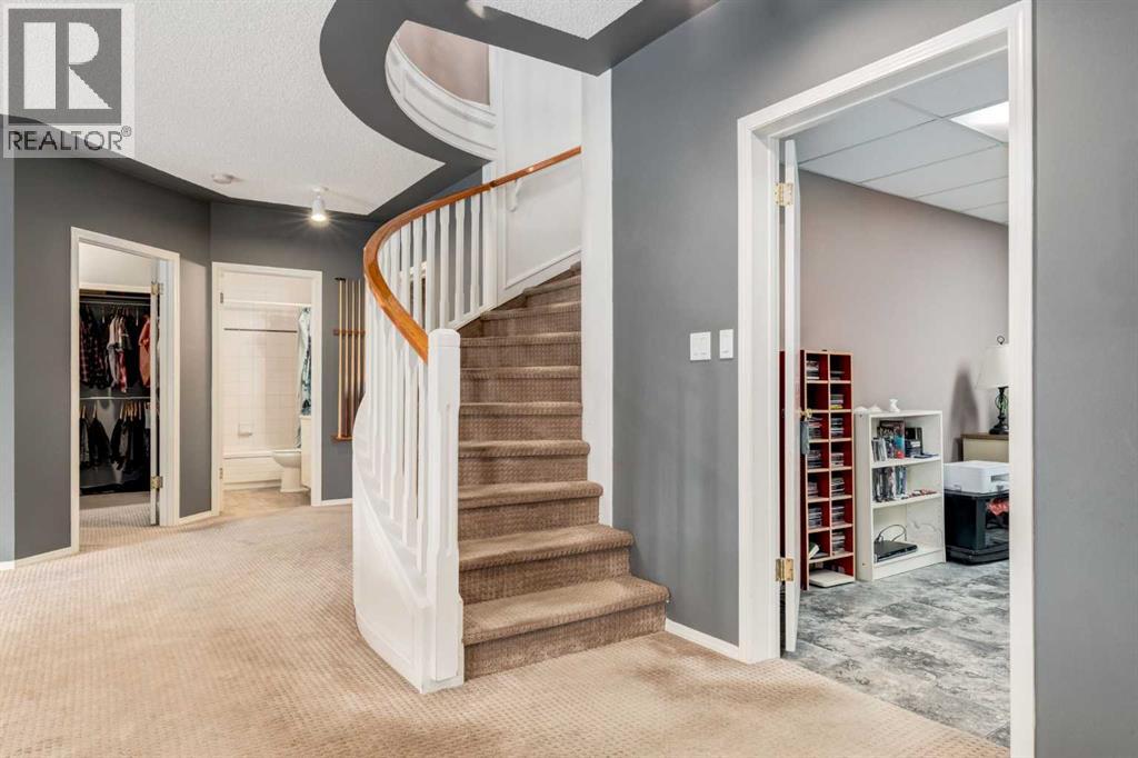 Single Family House Bungalow for Sale in  Hawkdale Circle NW Hawkwood Calgary 