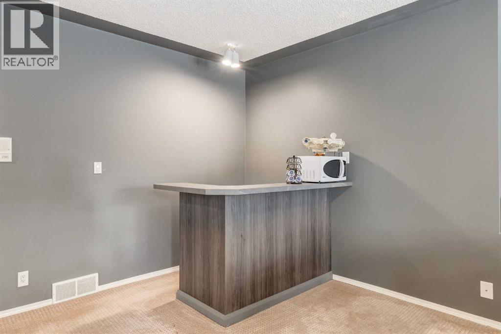 Single Family House Bungalow for Sale in  Hawkdale Circle NW Hawkwood Calgary 