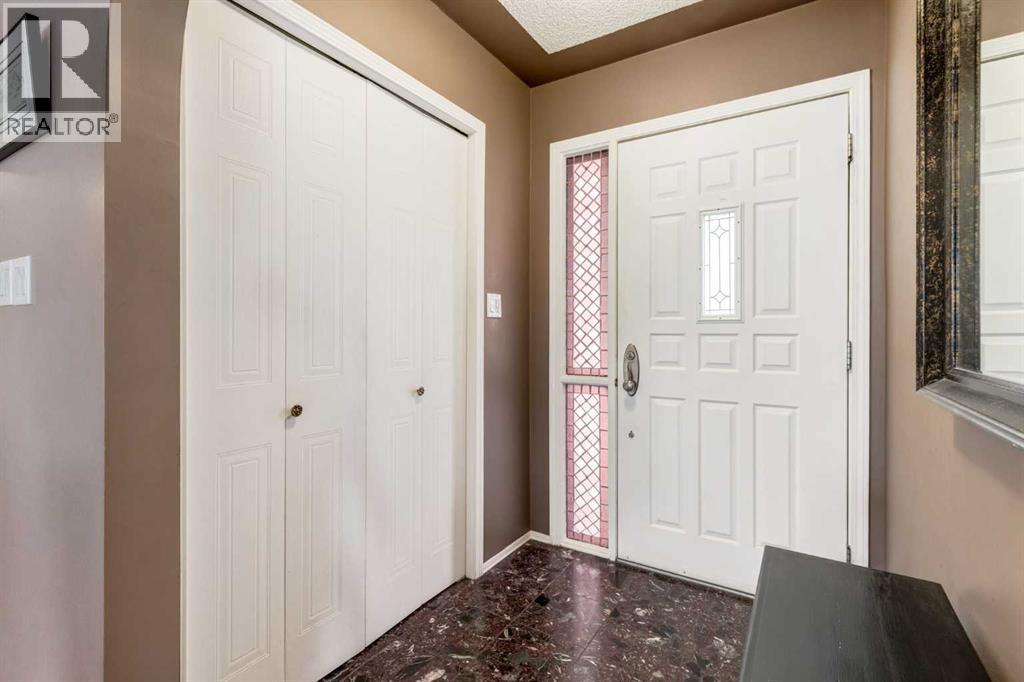 Single Family House Bungalow for Sale in  Hawkdale Circle NW Hawkwood Calgary 