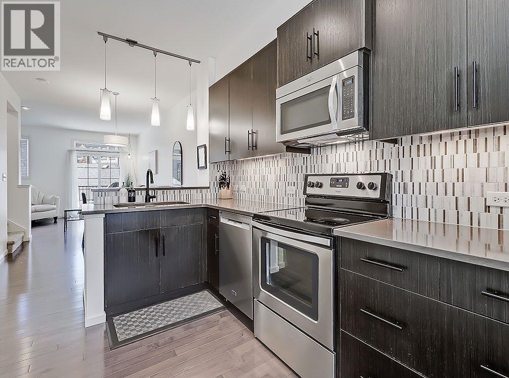Single Family House for Sale in  Ascot Circle SW Aspen Woods Calgary 