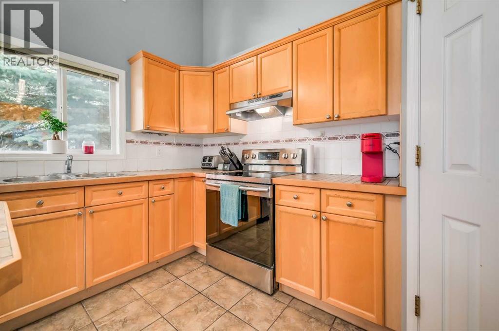 Single Family House 4 Level for Sale in  Country Hills Cove NW Country Hills Calgary 
