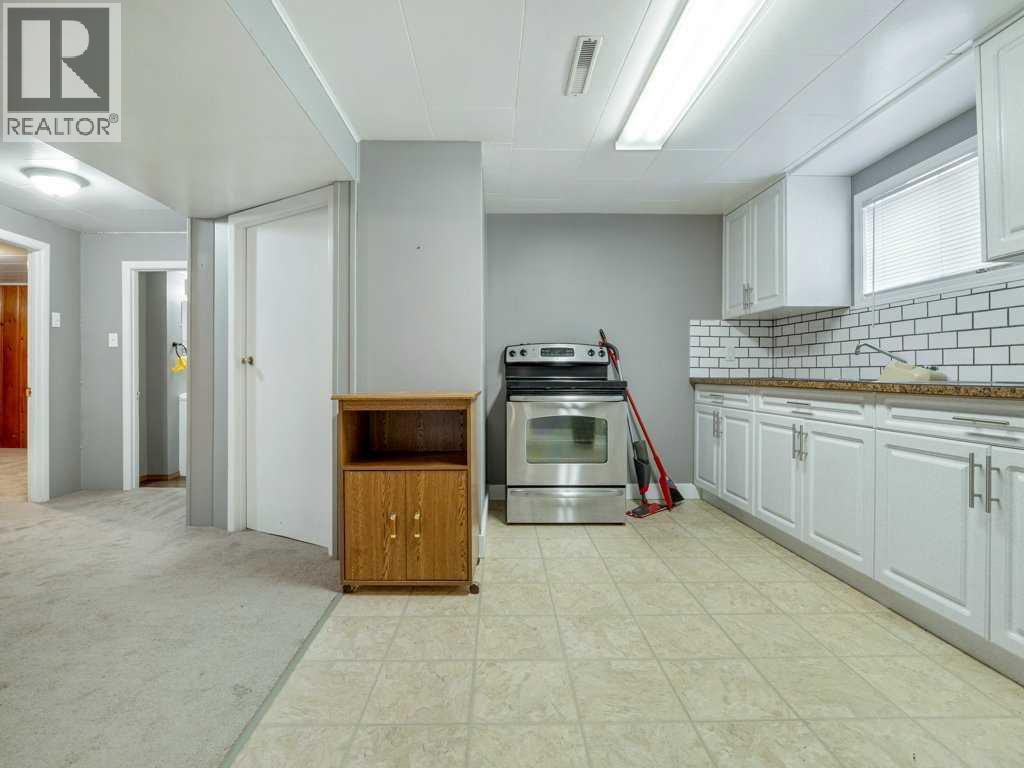 Single Family House Bungalow for Sale in   Street S Glendale Lethbridge 