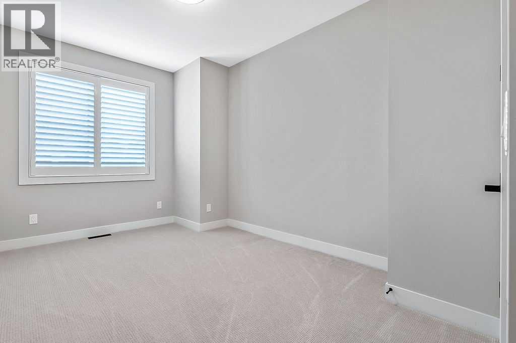 Single Family House for Sale in   Street SW Rosscarrock Calgary 