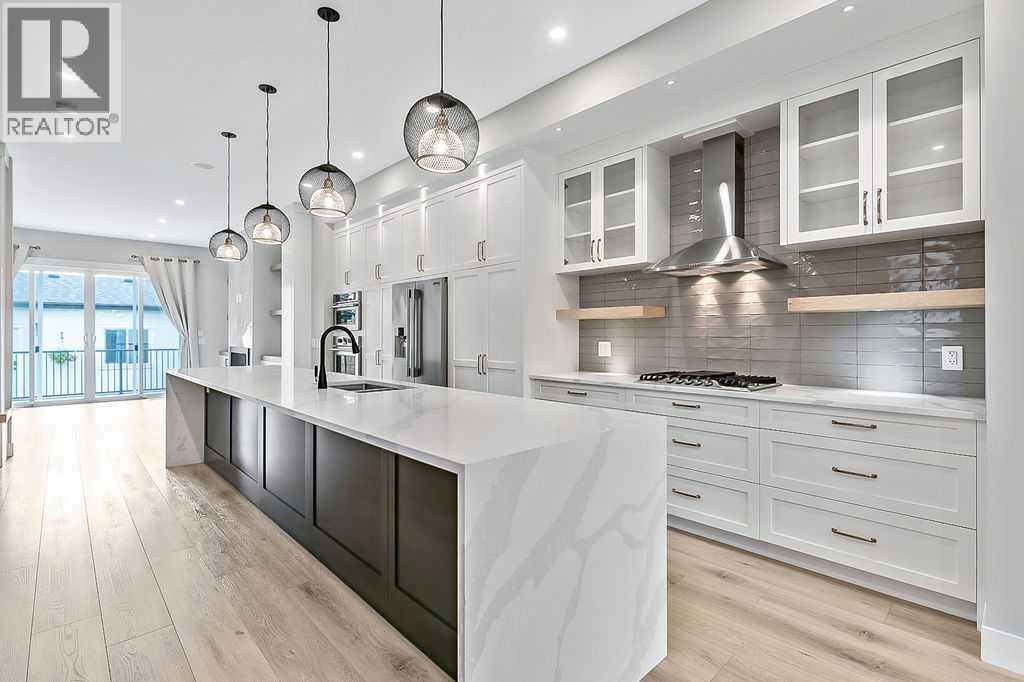 Single Family House for Sale in   Street SW Rosscarrock Calgary 
