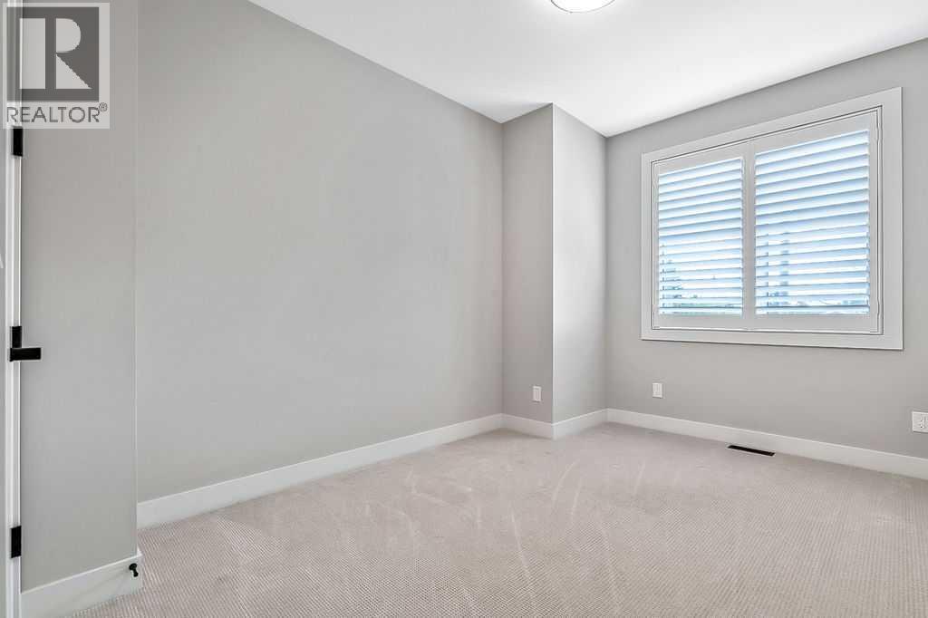 Single Family House for Sale in   Street SW Rosscarrock Calgary 