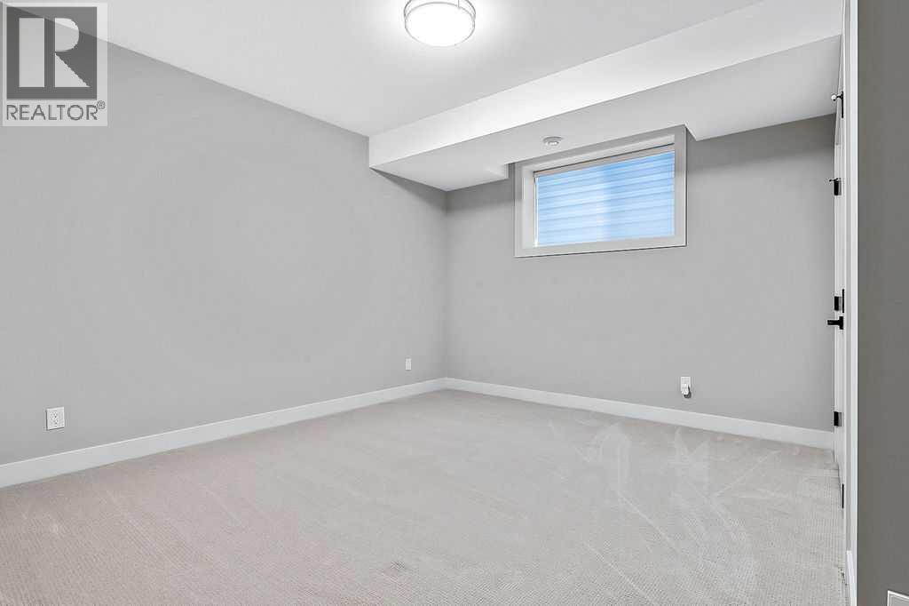 Single Family House for Sale in   Street SW Rosscarrock Calgary 