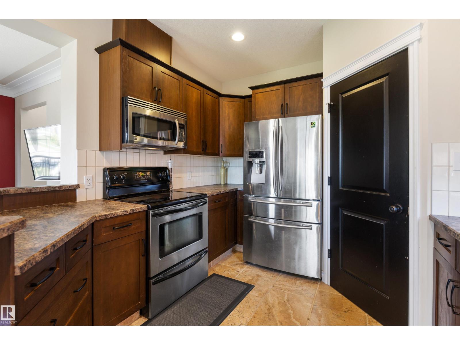 Photo 14 of 10416 99 St, Morinville AB