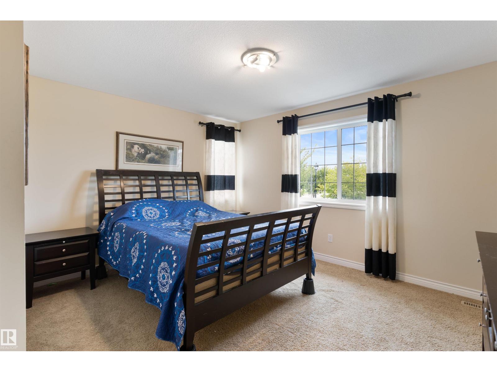 Photo 3 of 10416 99 St, Morinville AB