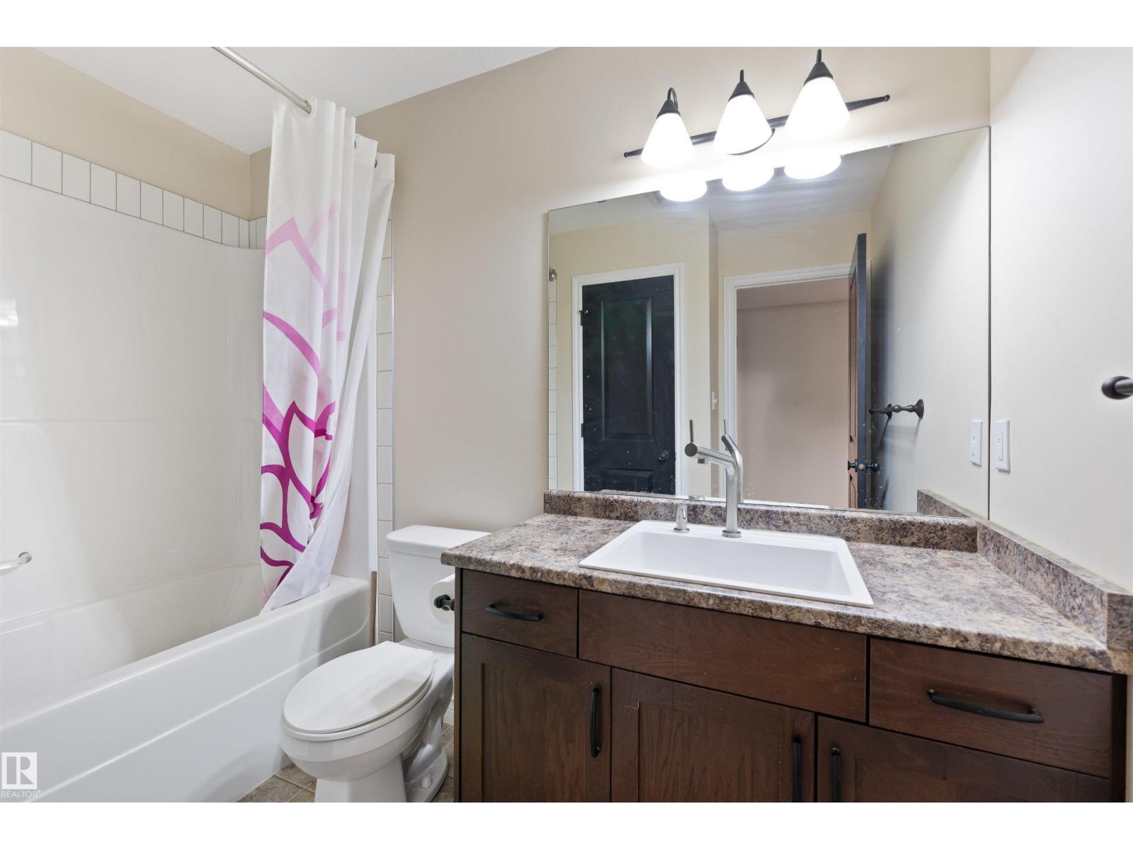 Photo 19 of 10416 99 St, Morinville AB