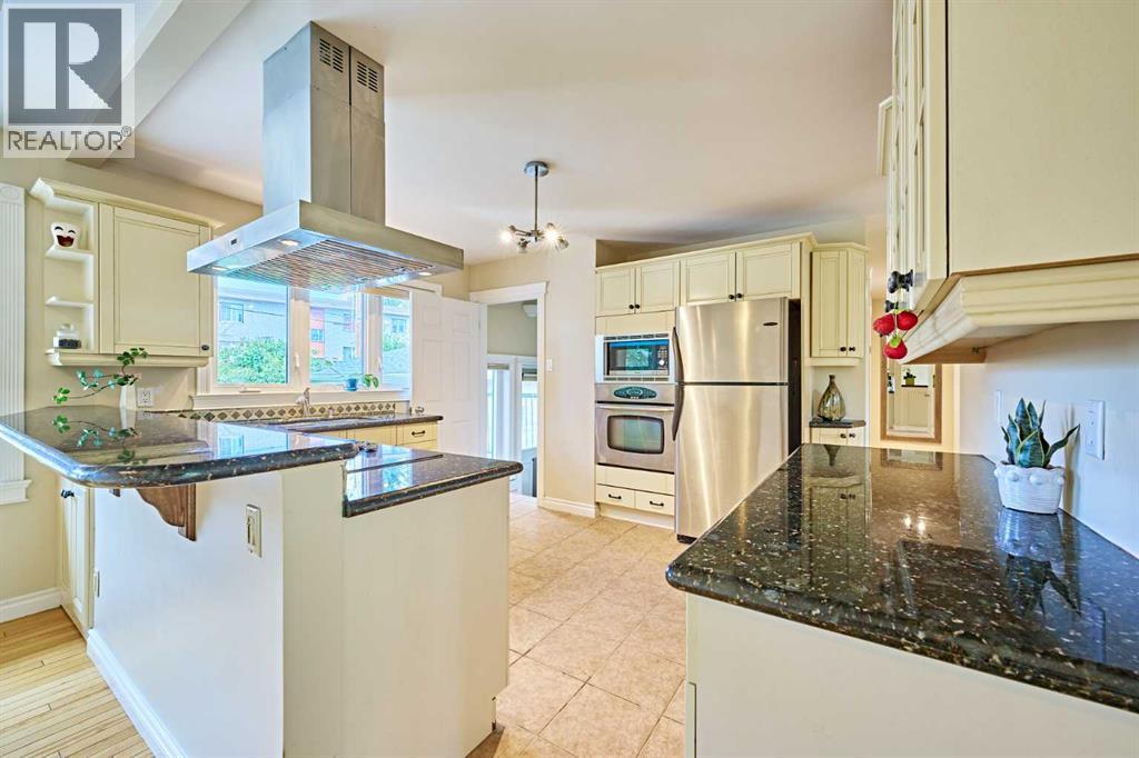 Single Family House Bungalow for Sale in  Kentish Drive SW Kingsland Calgary 