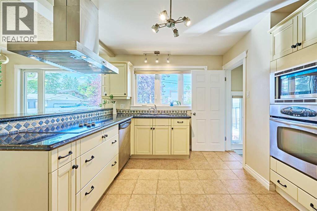 Single Family House Bungalow for Sale in  Kentish Drive SW Kingsland Calgary 