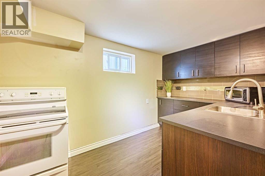 Single Family House Bungalow for Sale in  Kentish Drive SW Kingsland Calgary 