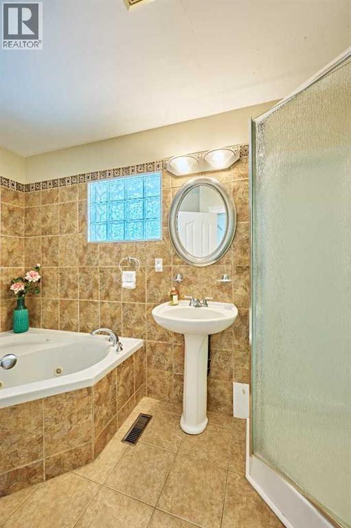 Single Family House Bungalow for Sale in  Kentish Drive SW Kingsland Calgary 