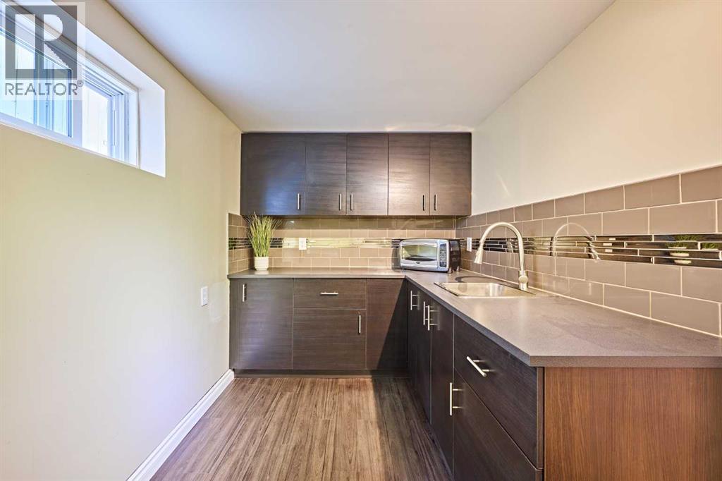 Single Family House Bungalow for Sale in  Kentish Drive SW Kingsland Calgary 