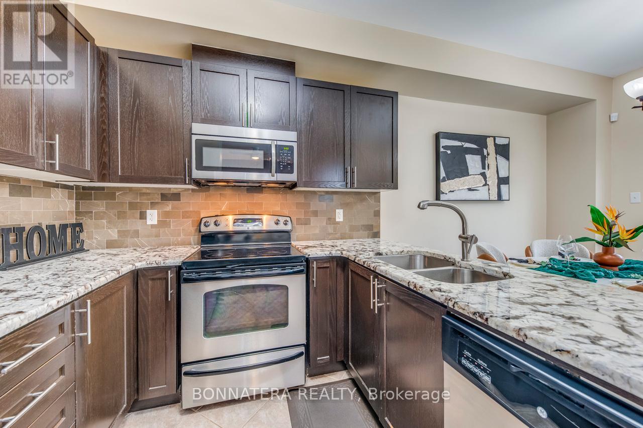 Photo 12 of 654 Murray Meadows Place, Milton ON
