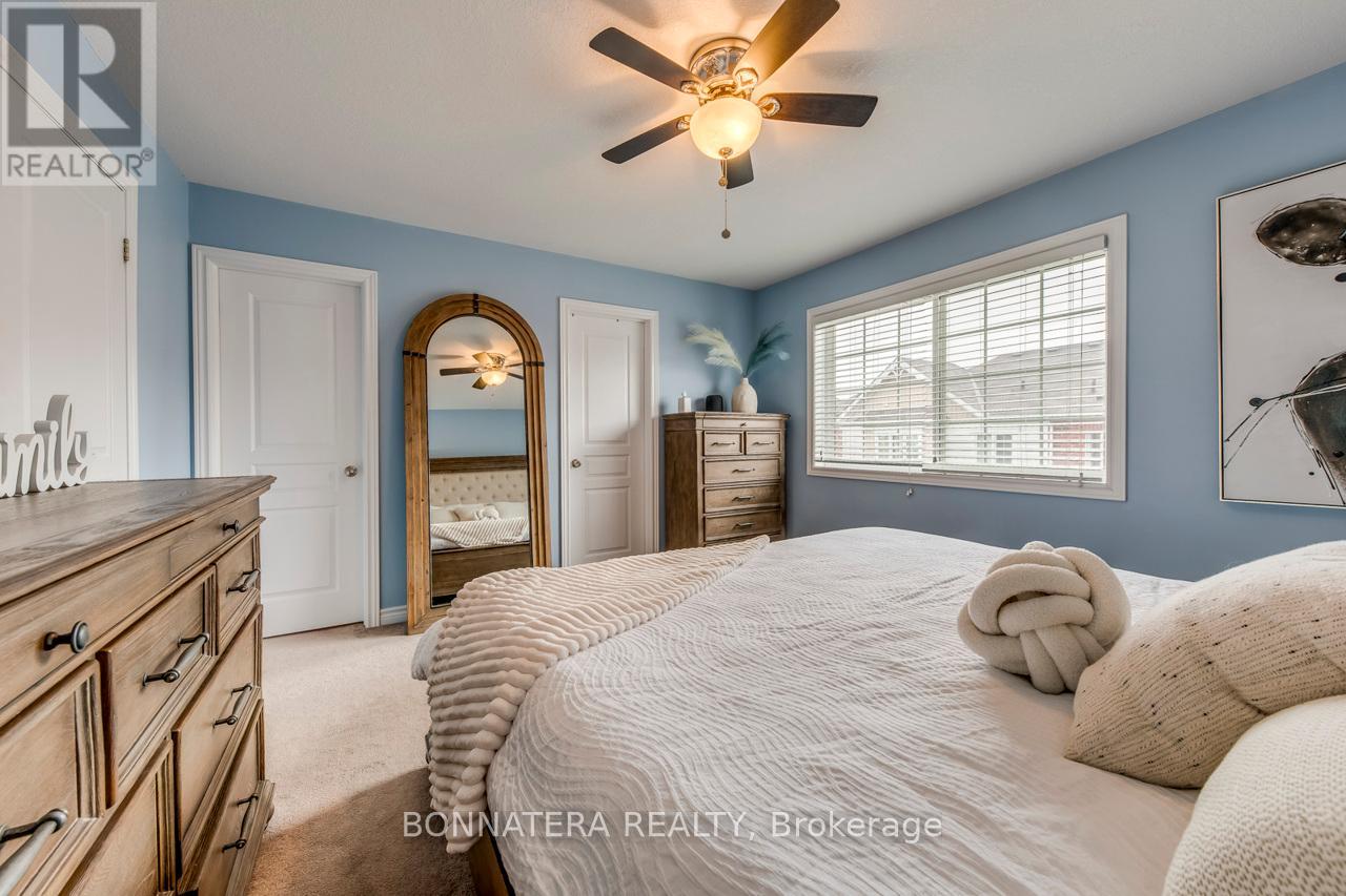 Photo 17 of 654 Murray Meadows Place, Milton ON