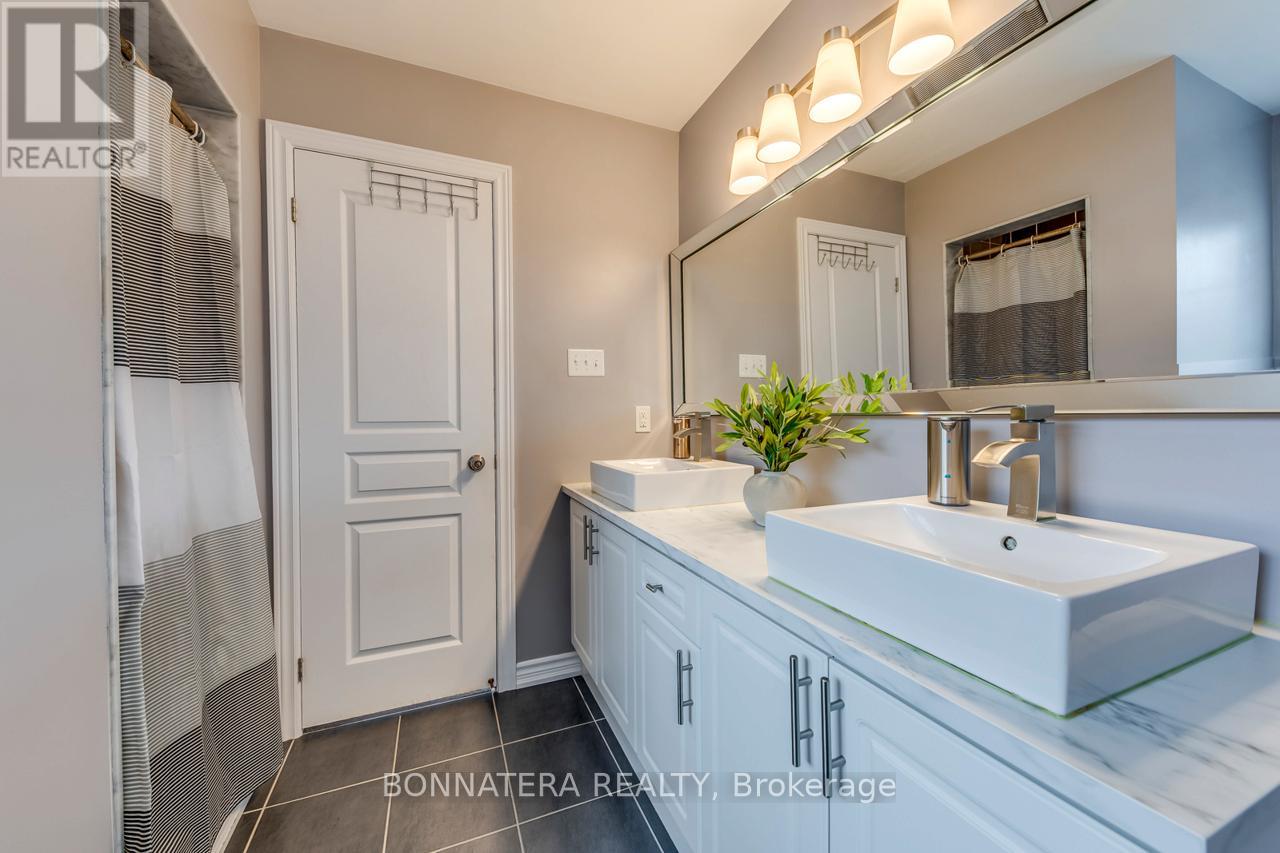 Photo 19 of 654 Murray Meadows Place, Milton ON