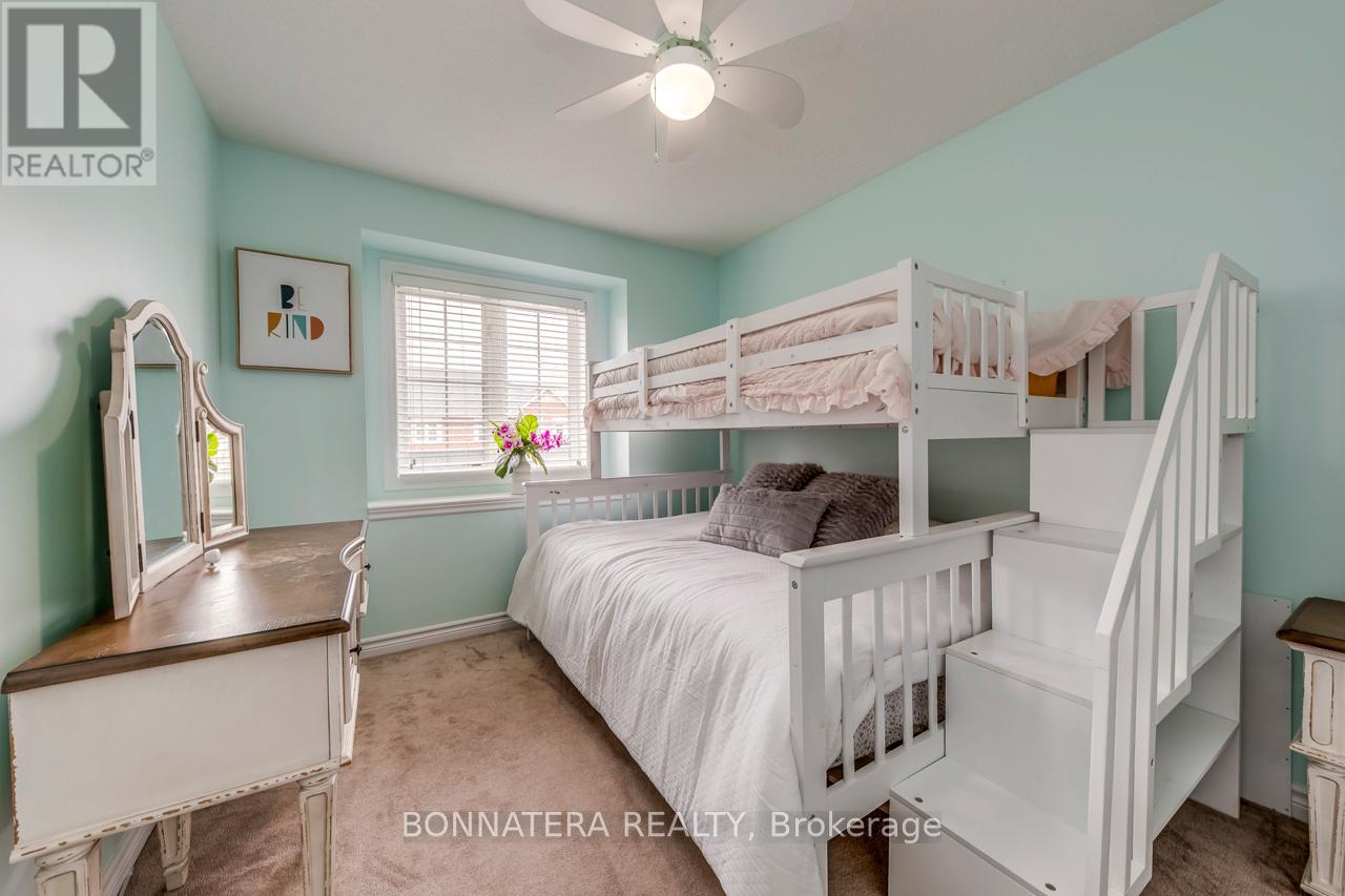 Photo 23 of 654 Murray Meadows Place, Milton ON