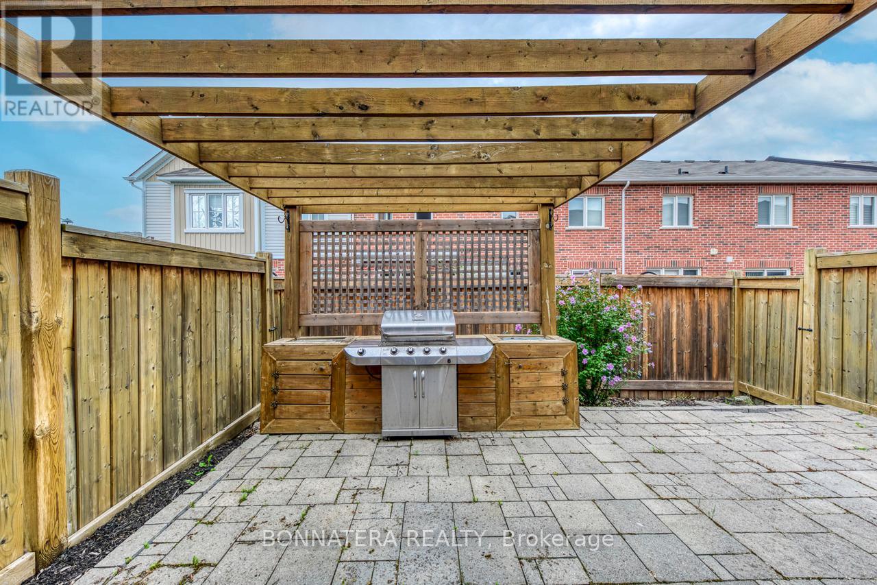 Photo 32 of 654 Murray Meadows Place, Milton ON