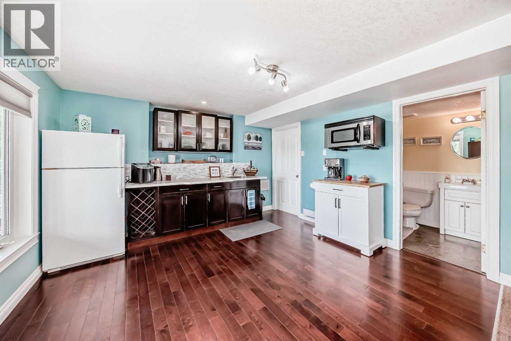 Photo 30 of 40 Bow Ridge Drive, Cochrane AB