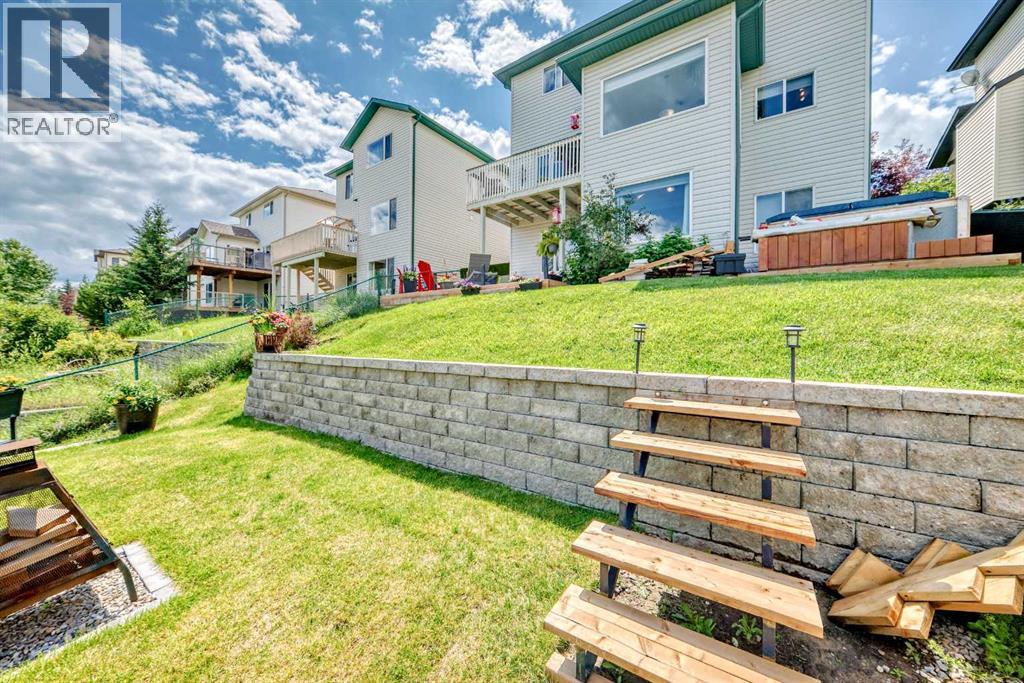 Photo 38 of 40 Bow Ridge Drive, Cochrane AB