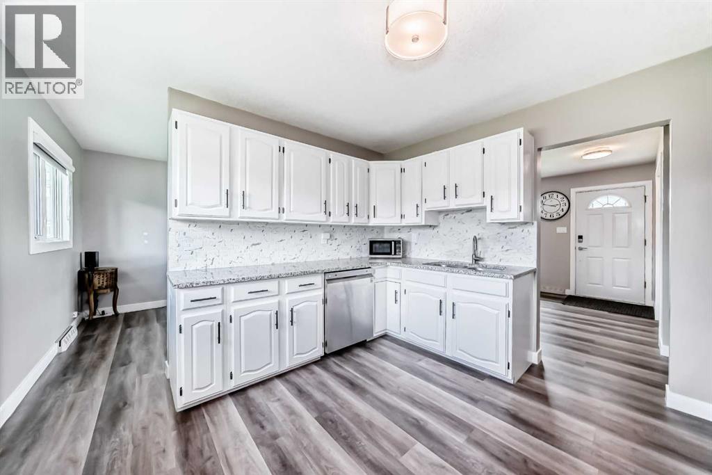 Single Family House Bungalow for Sale in   Street SW Kingsland Calgary 