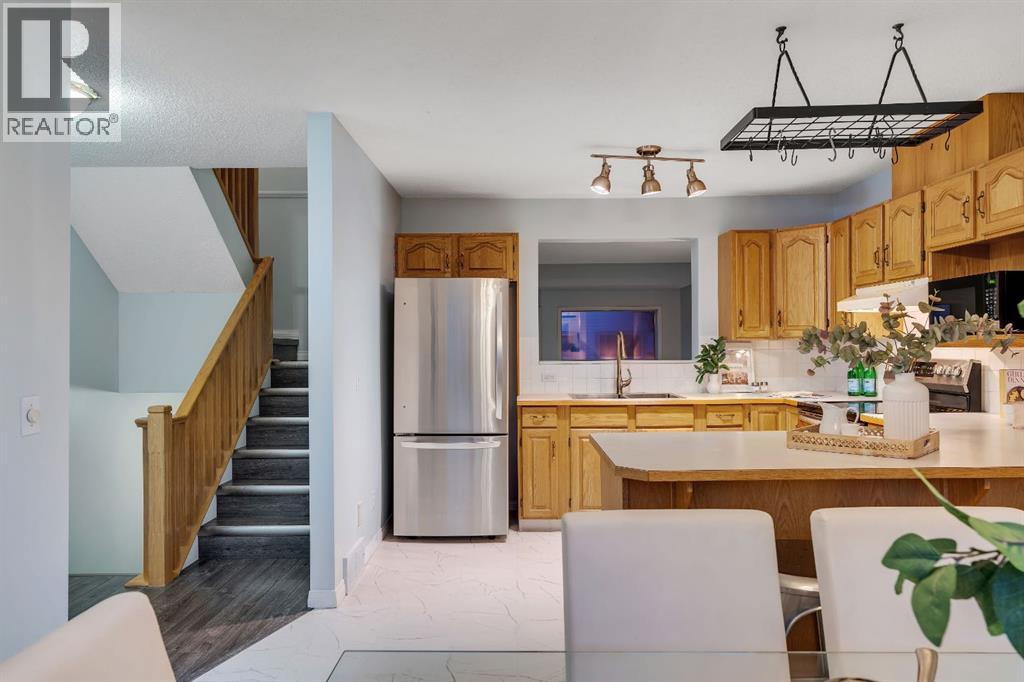 Single Family House 4 Level for Sale in  Kingsland Villas SW Kingsland Calgary 
