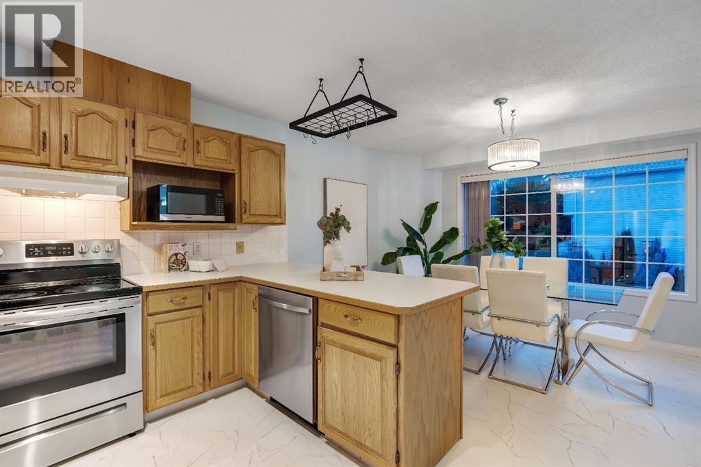 Single Family House 4 Level for Sale in  Kingsland Villas SW Kingsland Calgary 